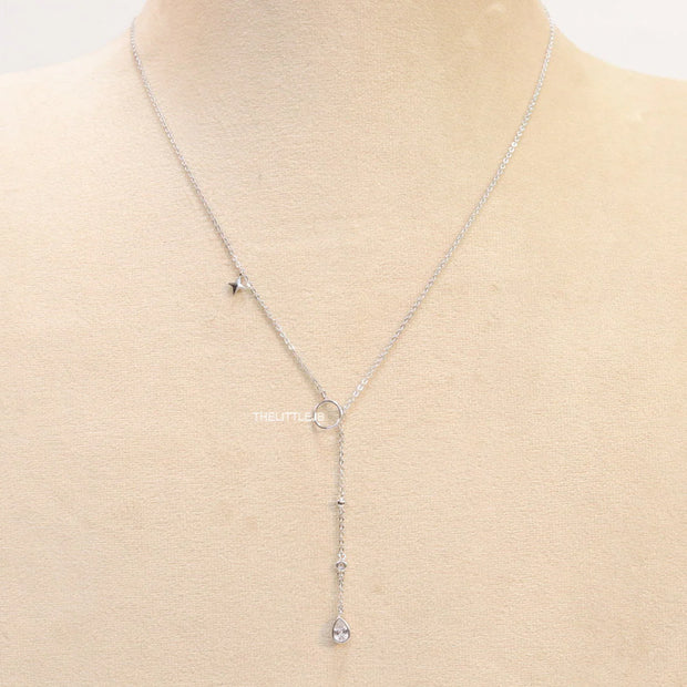 Platinum knot necklace with cz drop and small charms