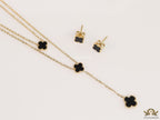 Dual chain necklace with black onyx clovers in gold finish