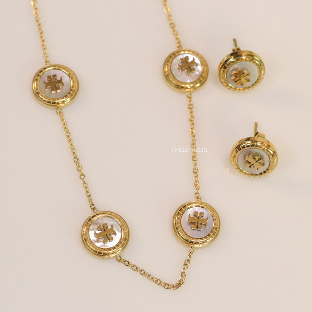Gold plated necklace set with T motif mother of pearl discs