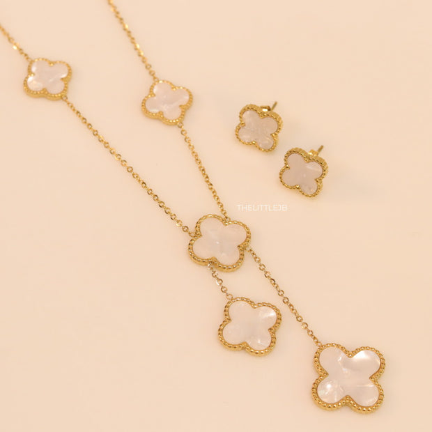 Gold plated necklace set with mother of pearl clovers