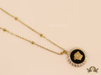 Gold plated Athena necklace in black base