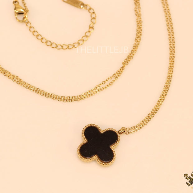 Gold plated chain with black onyx clover pendant