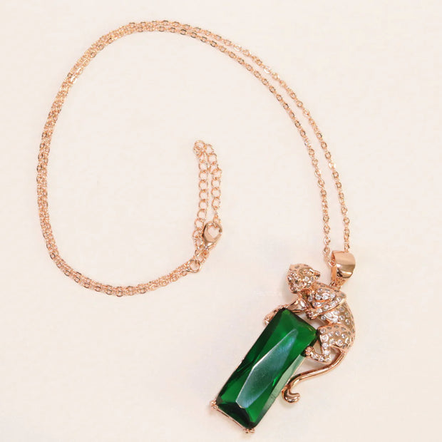 Rose gold plated leopard on green stone pendant necklace with cz