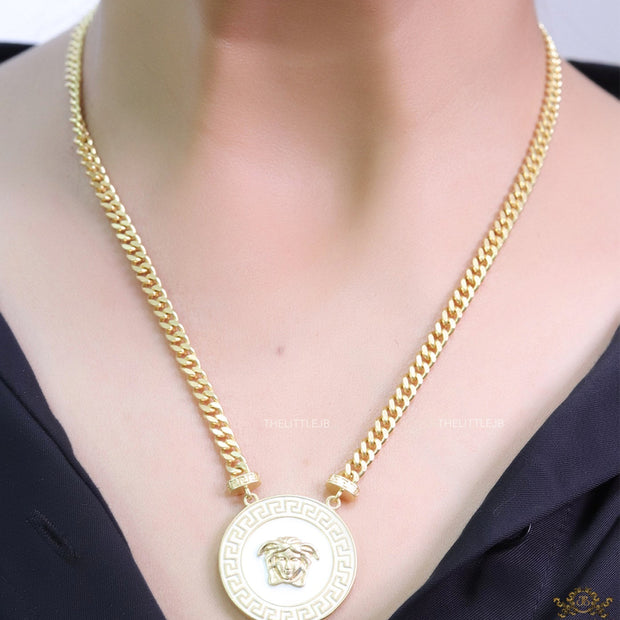 Gold plated thick chain necklace with white and golden Medusa pendant