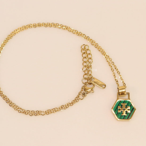 Gold plated necklace with malachite green T motif pendant