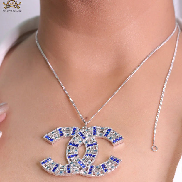 Platinum chain alphabet necklace with coloured cz