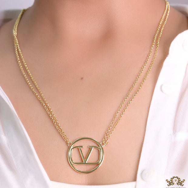 Dual chain golden necklace with alphabet pendant