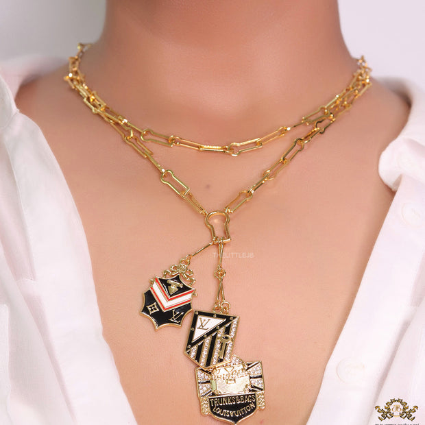 Dual link chain necklace with three in one pendant
