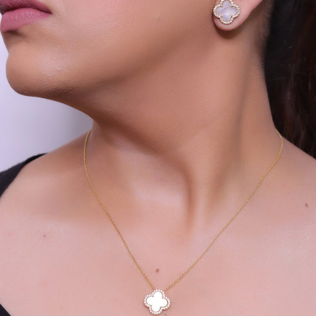 Sleek gold plated chain with cubic zirconia studded off-white clover shape pendant