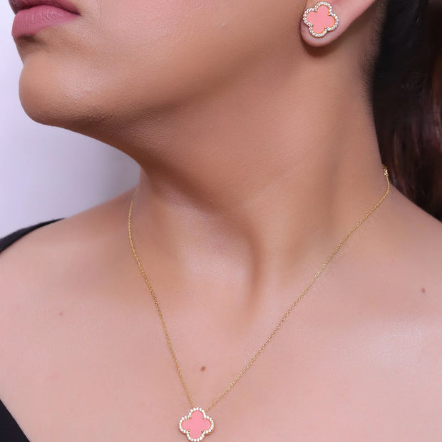 Sleek gold plated chain with cubic zirconia studded pink clover shape pendant