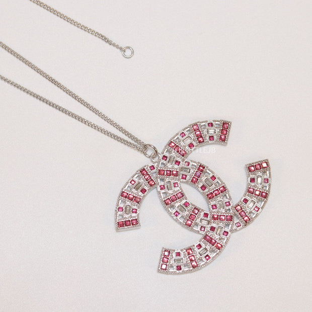 Platinum chain alphabet necklace with coloured cz
