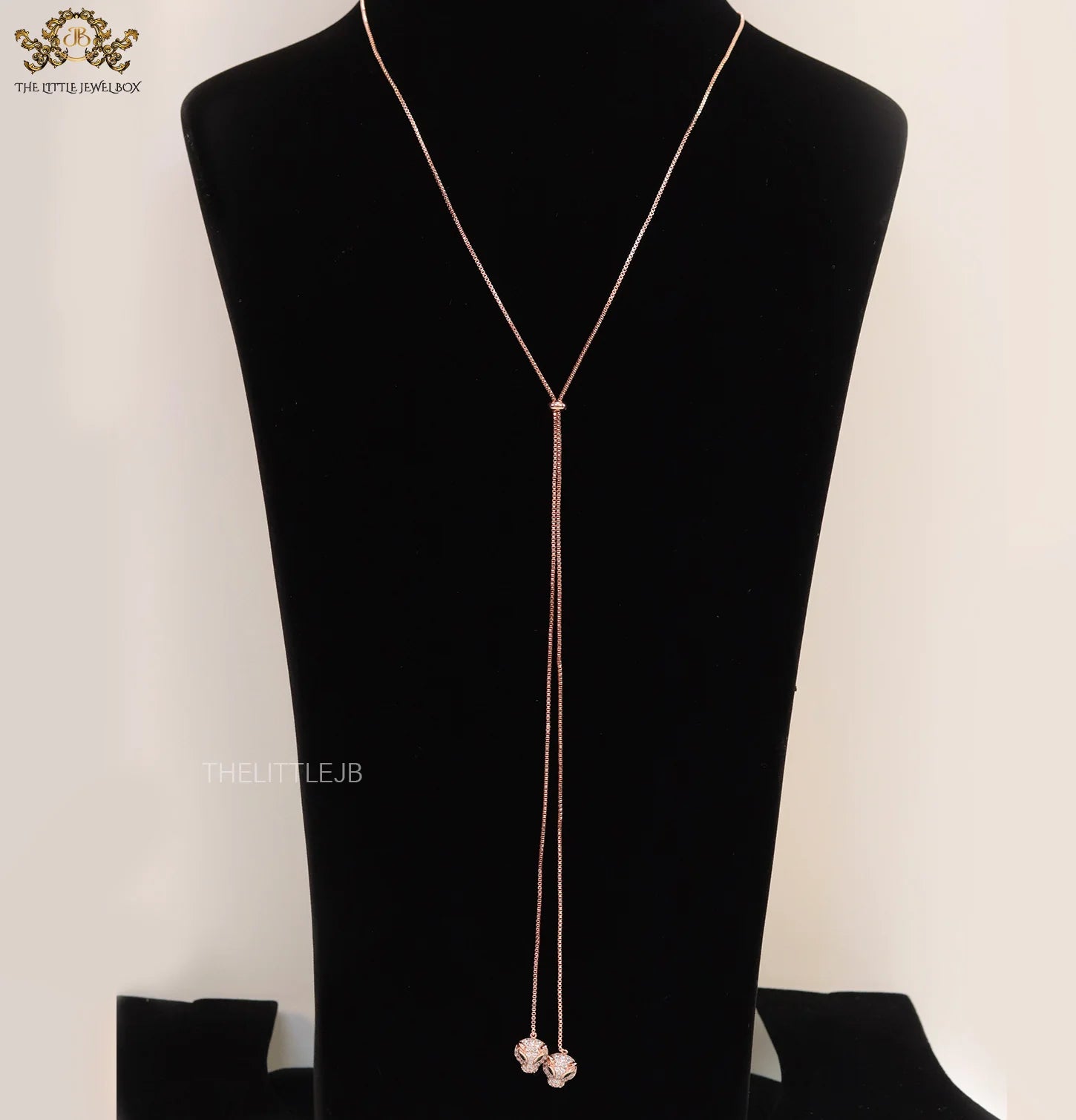 Rose gold plated knot necklace with twin cz panther pendants