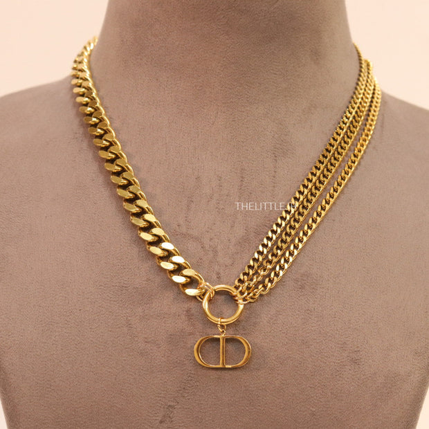 Multiple golden chain necklace with alphabet pendant