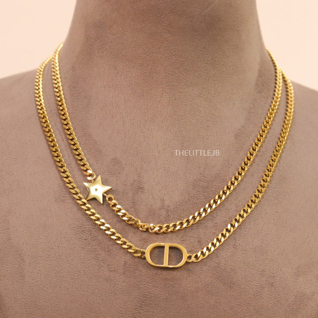 Dual chain necklace with alphabet and star motif