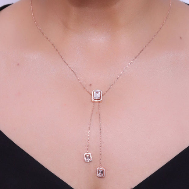 Emerald cut cubic zirconia stones in different sized on sleek rose gold plated chain