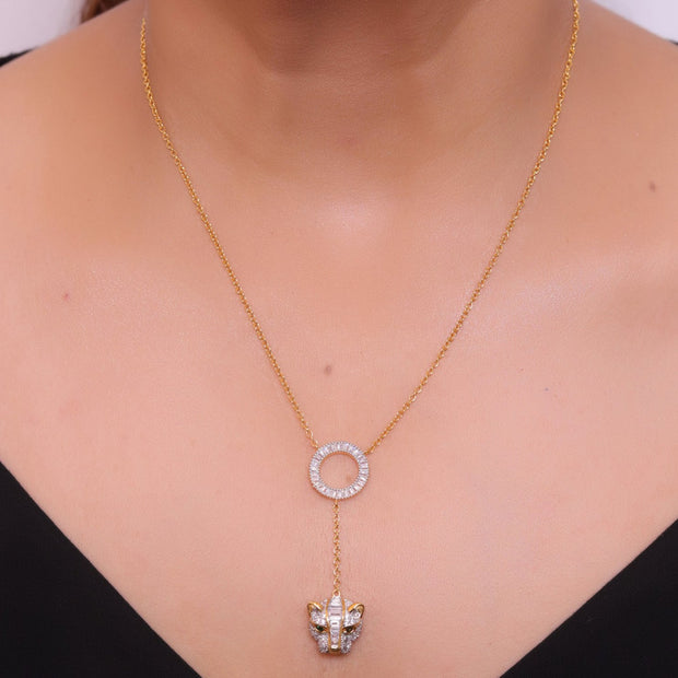 Gold plated sleek chain with circular cubic zirconia disk and gold plated panther face motif pendant