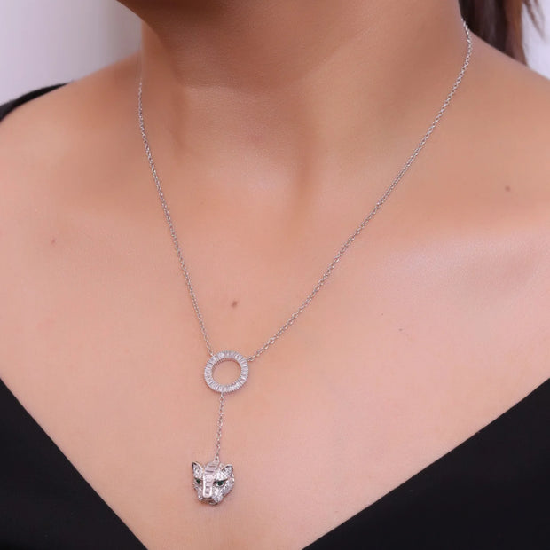 Platinum plated sleek chain with circular cubic zirconia disk and Platinum plated panther face motif pendant