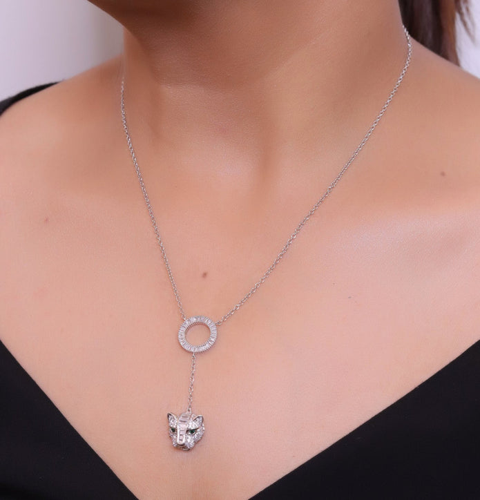 Platinum plated sleek chain with circular cubic zirconia disk and Platinum plated panther face motif pendant
