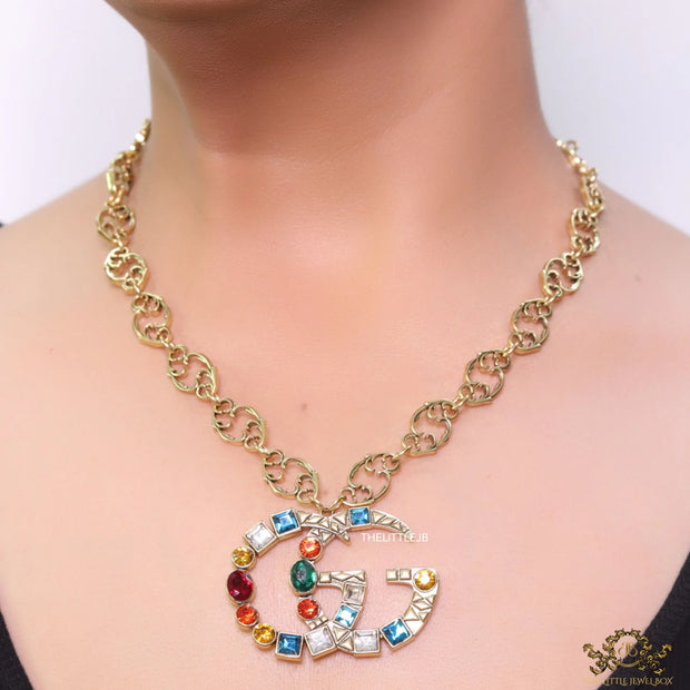 Golden fancy link chain necklace with multi cz twin G pendant