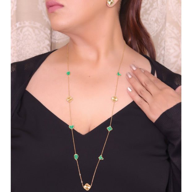Emerald green clover heart and other shape charms on a sleek long gold plated chain with matching studs