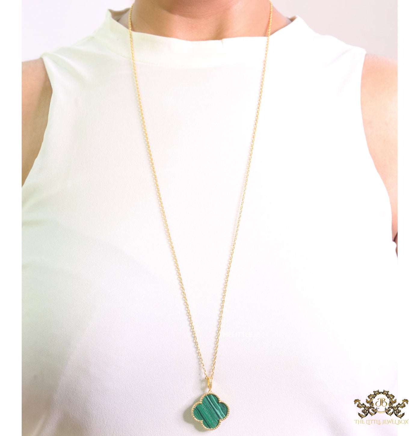 Malachite green clover pendant in gold plated chain