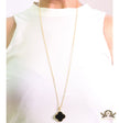 Black enamel clover pendant in gold plated chain