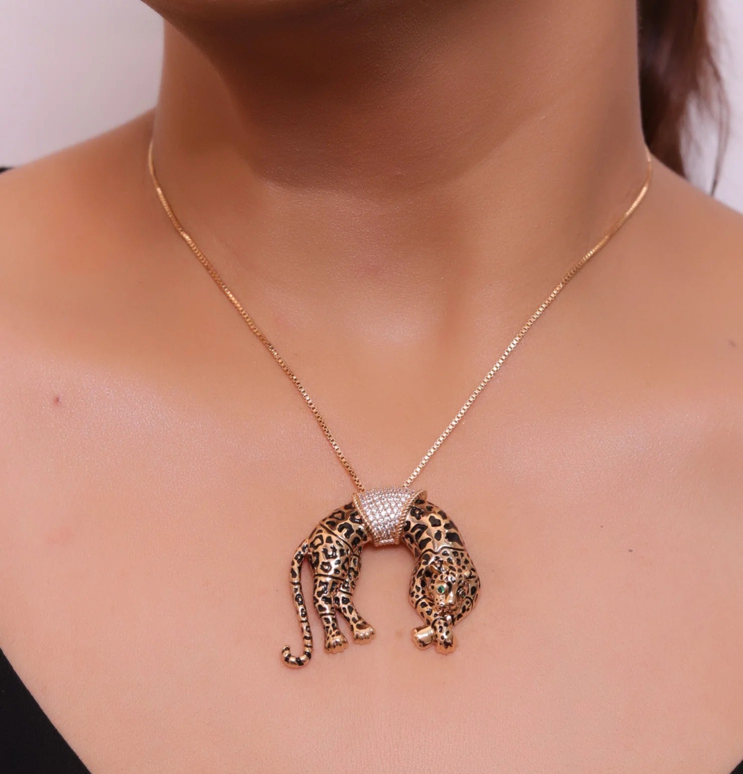 Antique rose  gold resting plated leopard pendant with cubic zirconia and rose golden chain