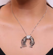 Platinum plated resting leopard pendant with cubic zirconia and Platinum chain