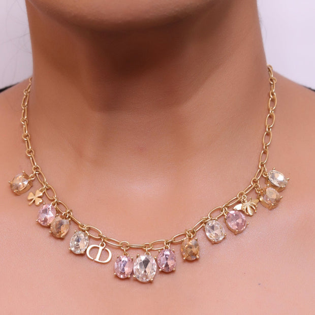 Gold plated link chain with semi precious stones charms and alphabet charm