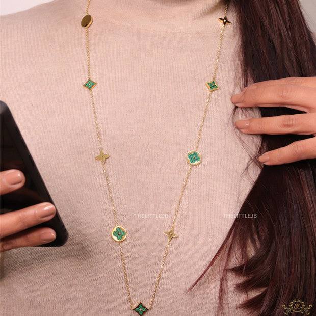 Golden chain necklace with malachite green clovers