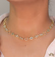 Choker style necklace with charms in gold finish