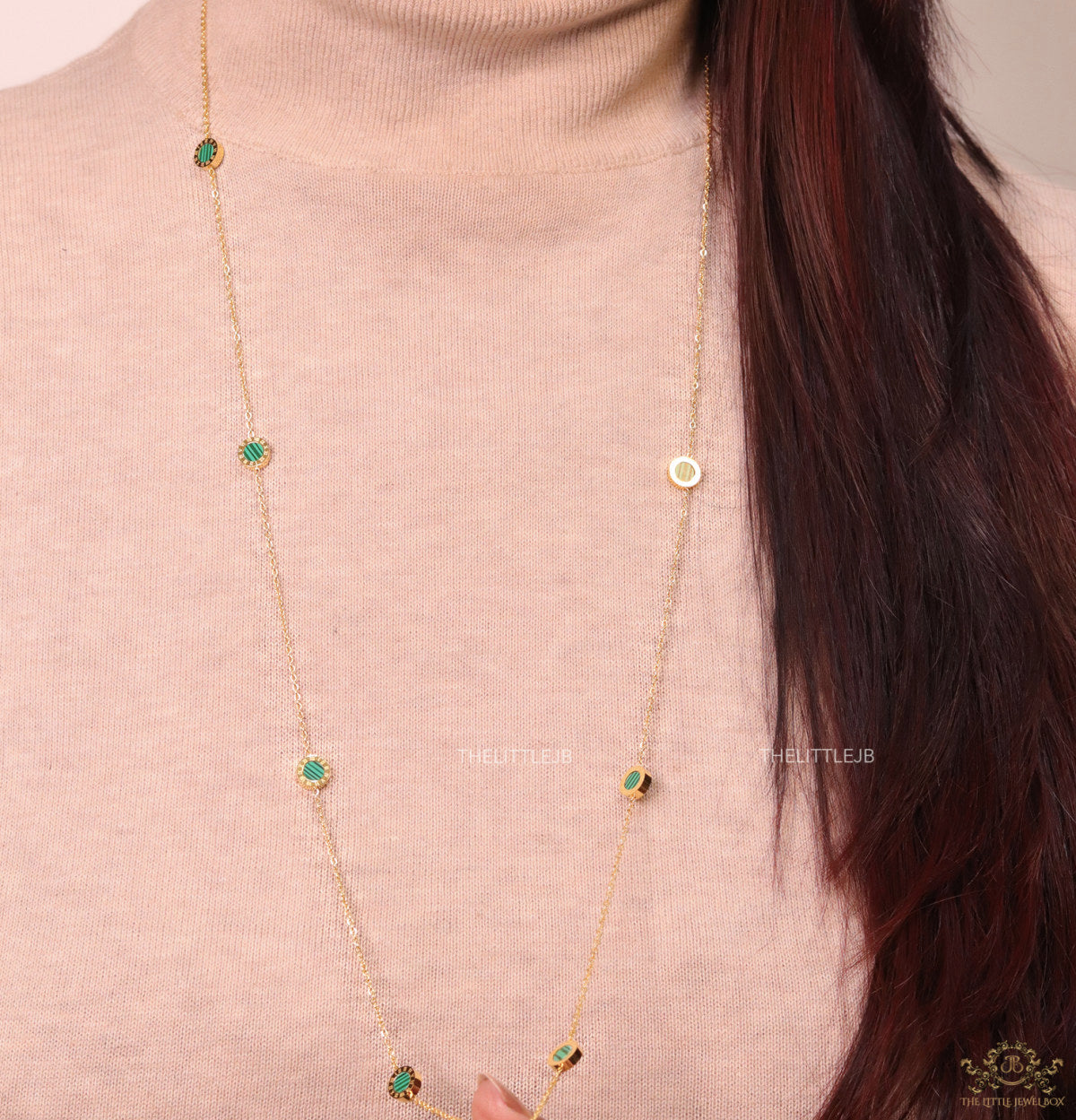 Golden chain necklace with malachite green roman numeral discs