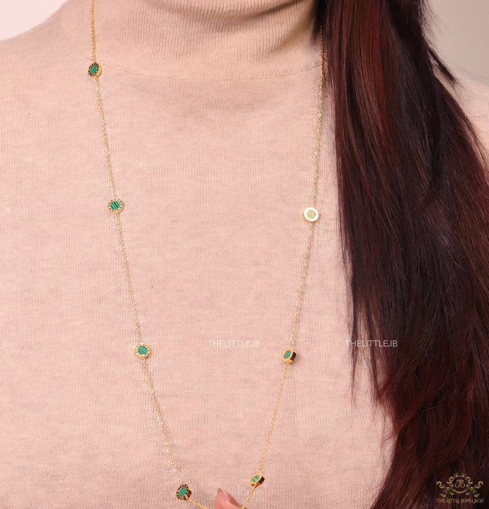 Golden chain necklace with malachite green roman numeral discs