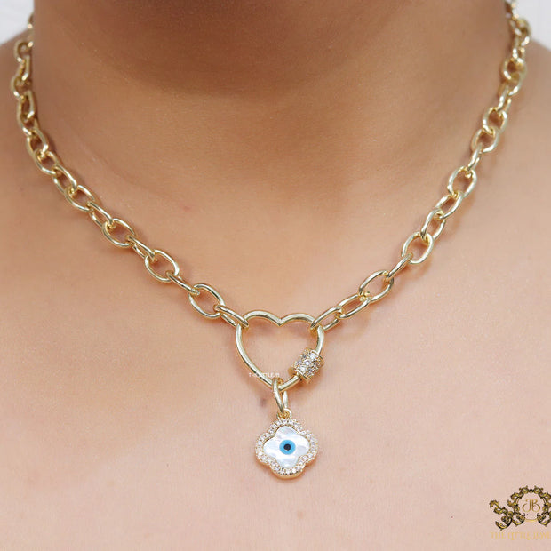 Gold plated link chain necklace with heart shaped lock and evil eye clover pendant