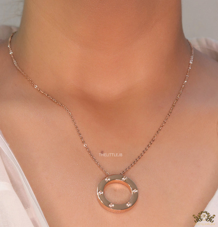 Rose gold plated disc shape pendant necklace with cz