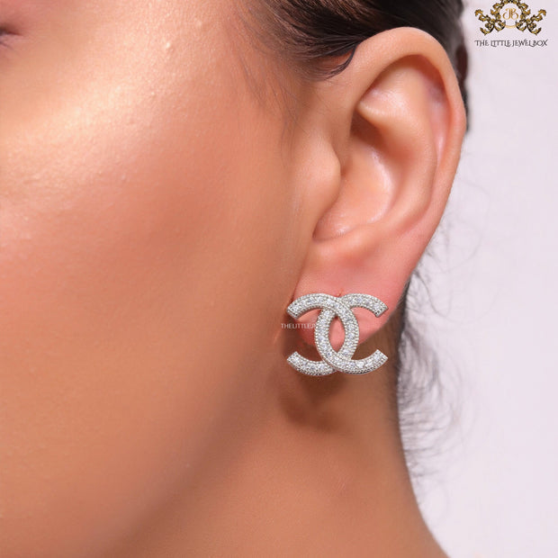 Platinum plated twin C motif cz studs