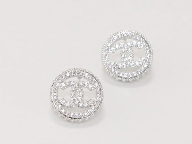 Round double C studs with CZ in platinum