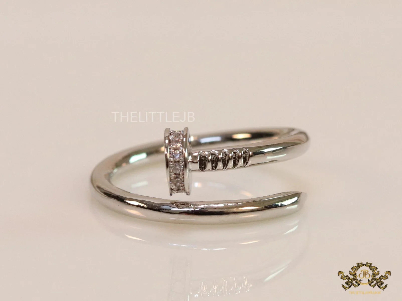 Platinum plated cz nail ring