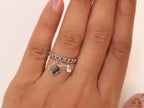 Platinum plated link chain ring with black clover and cz drop