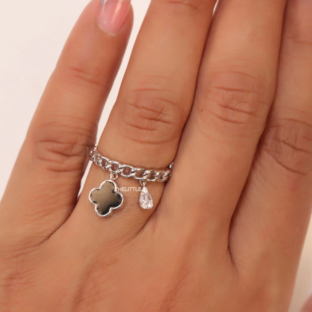 Platinum plated link chain ring with black clover and cz drop