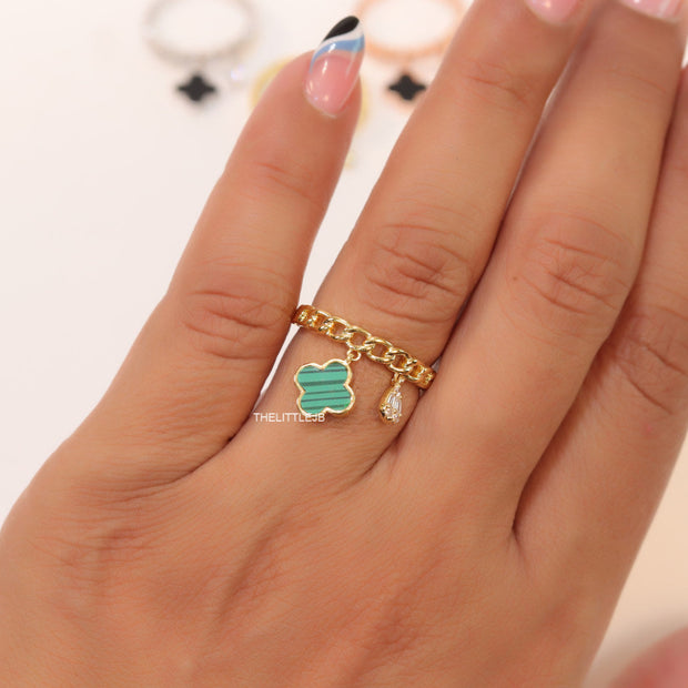 Gold plated link chain ring with malachite green clover and cz drop