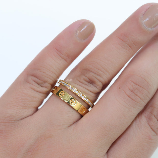 Double layered gold finish open ring with screws and cz