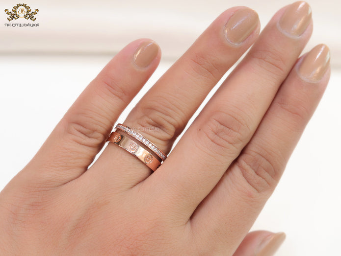 Double layered rose gold finish open ring with screws and cz