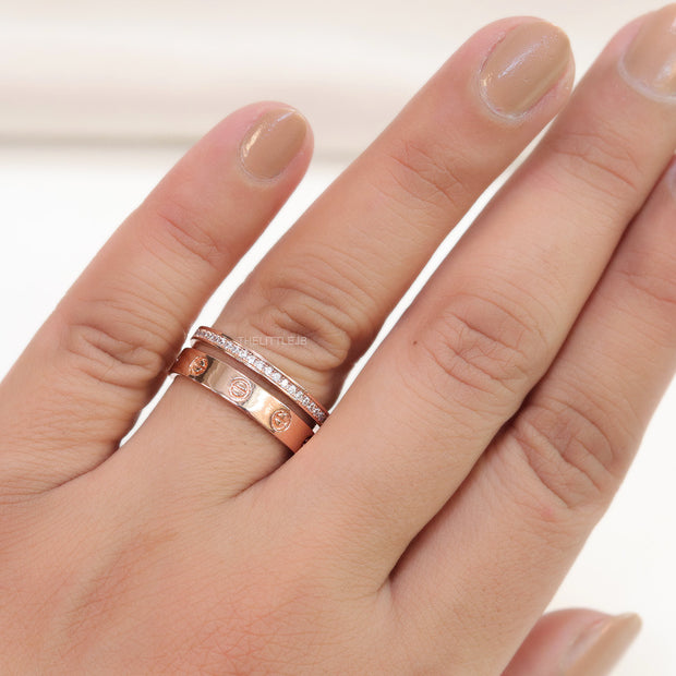 Double layered rose gold finish open ring with screws and cz