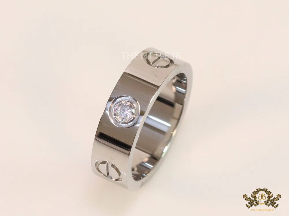 Broad 6mm platinum plated band with screws and stones
