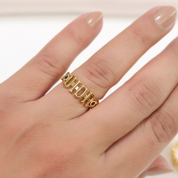 Gold plated alphabet open ring with black cz
