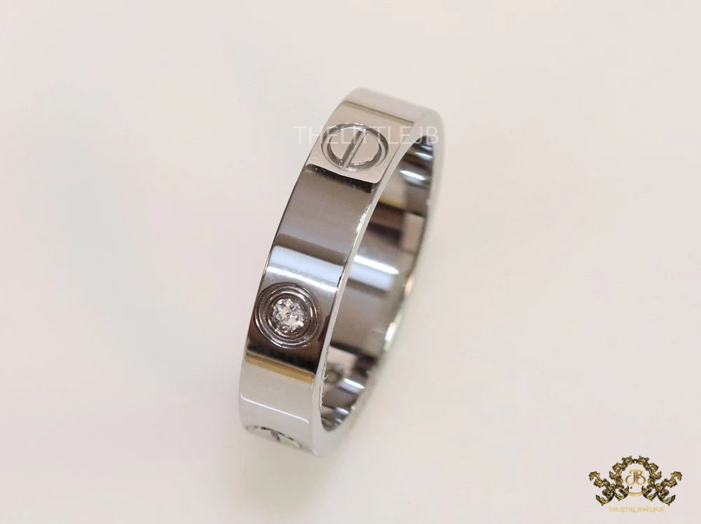 Narrow 4.5mm platinum plated band with screws and stones