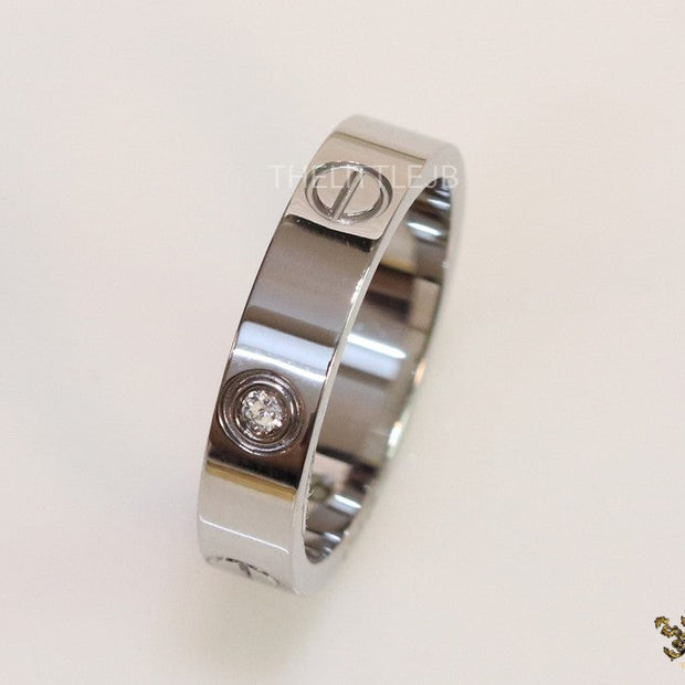 Narrow 4.5mm platinum plated band with screws and stones