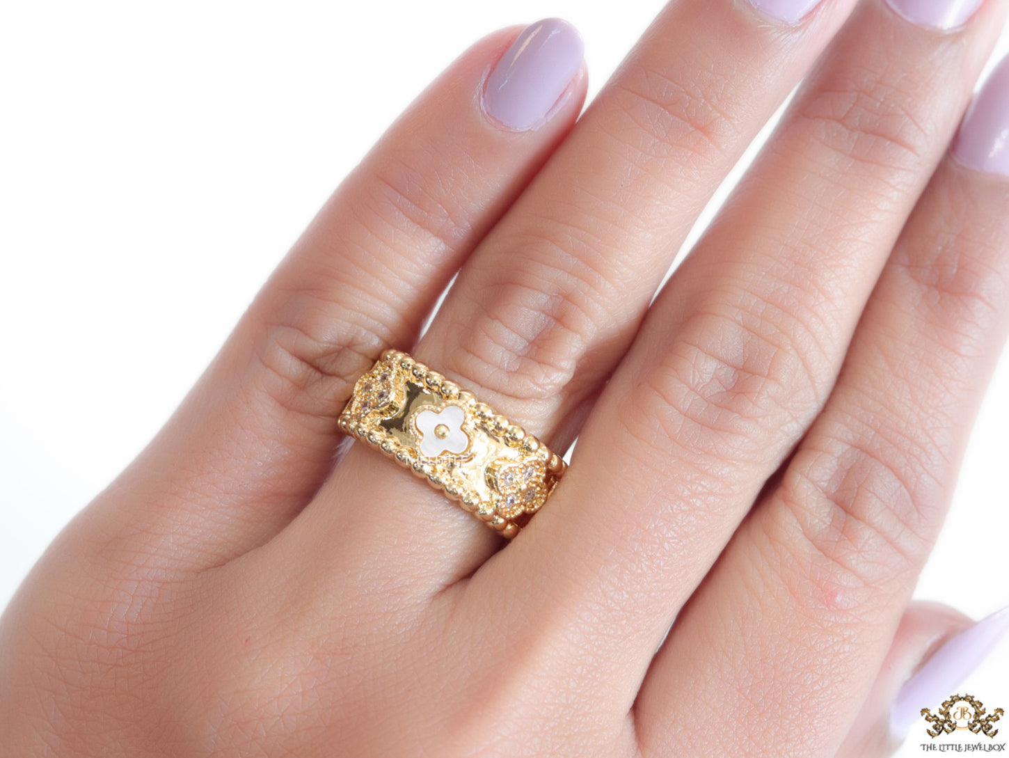 Golden ring band with MOP and cz clovers