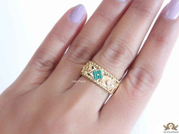 Golden ring band with malachite green and cz clovers